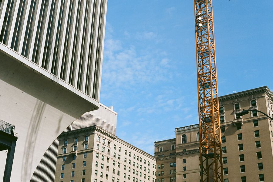 Various buildings and a construction crane