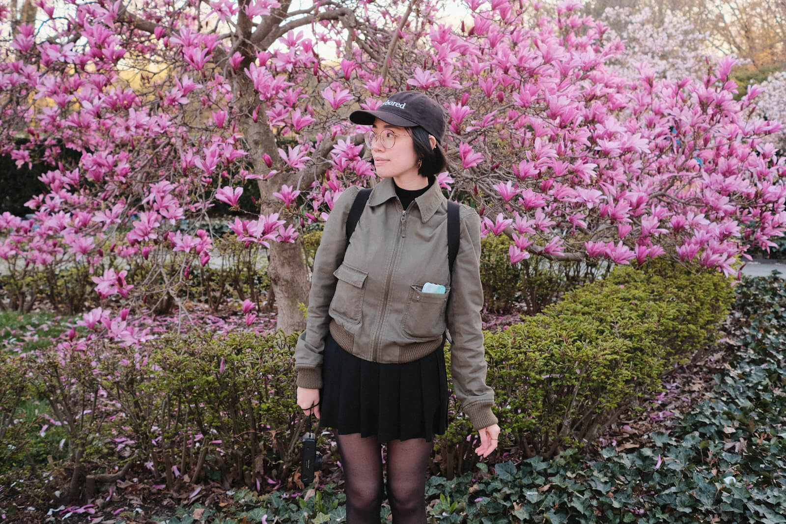 Me, standing in front of a pink magnolia tree.