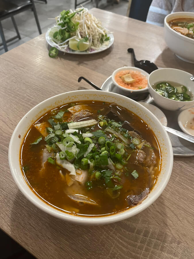 Big spicy noodle soup bowl.