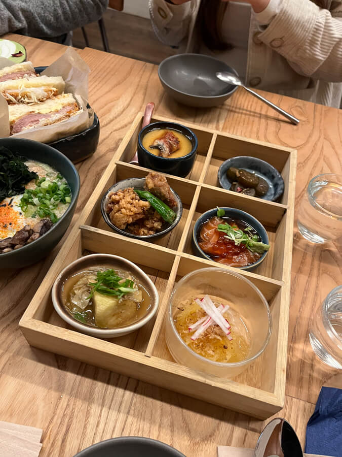 A box of six small, fancy looking dishes.