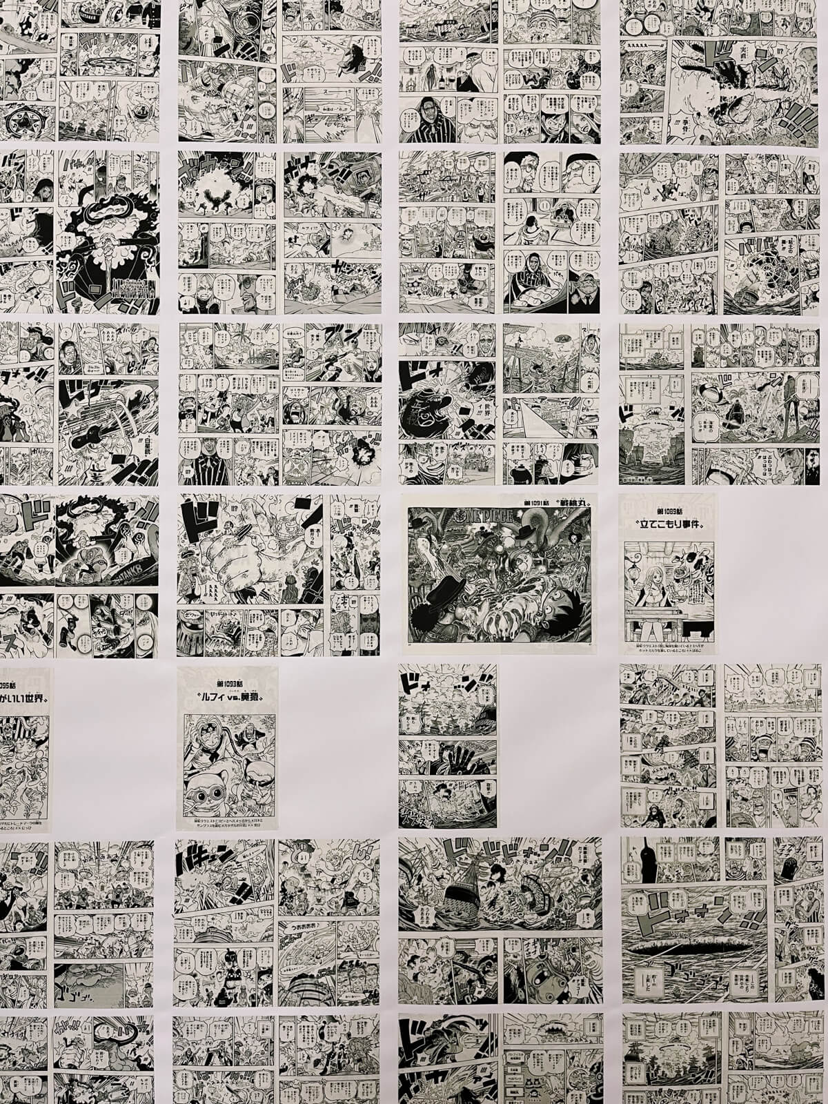 A wall covered with pages from One Piece.