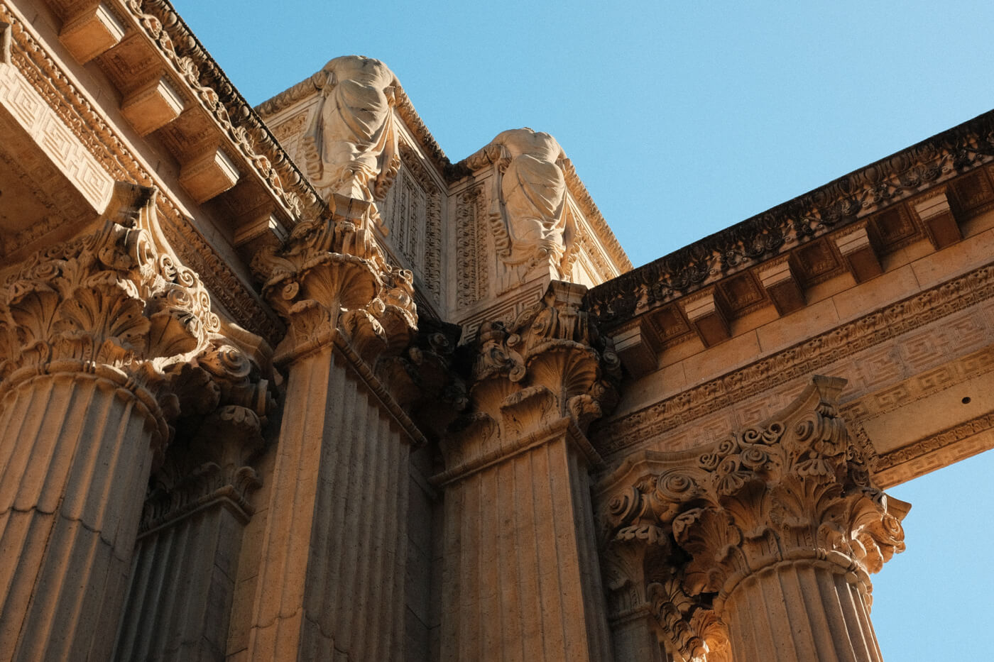 Closeup of a corner of the structure, which features intricate columns.